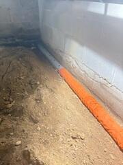 StarPipe was used to direct seeping water away from the home's foundation.