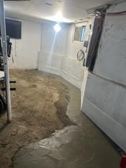 In order to stop water at its entry point, we installed our WaterGuard Drainage System along the interior perimeter of the basement. This innovative system captures groundwater before it reaches the floor, directing it straight to the sump pump for safe removal.
