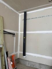 During: Our Foreman, Dakota, and his crew successfully secured the Radon Mitigation System in the basement.