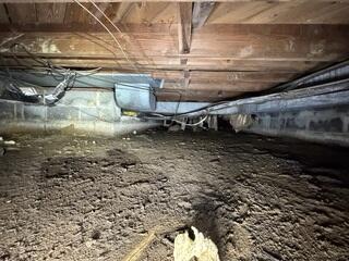 This crawl space had moisture issues which was affecting the temperature.