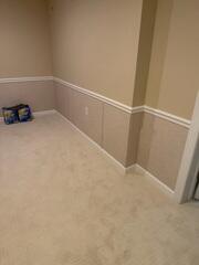 EverLast Wall Panels were installed to replace moisture-prone wall materials with a durable, mold-resistant alternative.