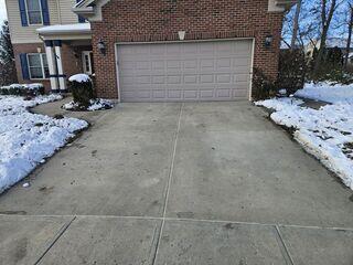 This photo was taken after we finished the project. The driveway looks a thousand times better, and more importantly, it will stay that way.