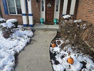 This photo was taken after we finished the project. The concrete was lifted and leveled, and the joints and the surfaces of the concrete were sealed.