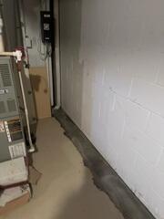 We installed our WaterGuard Drainage System to capture and redirect groundwater before it could reach the basement floor. This system provides reliable perimeter drainage, preventing water from causing structural damage or persistent dampness.