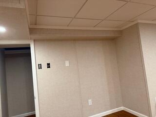 Our EverLast Wall Panel System was chosen for its moisture-resistant, mold-proof, and highly durable construction, ensuring the basement stays protected while offering a clean, attractive, and long-lasting finished appearance.