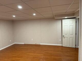 To complete the transformation, our ThermalDry Elite Plank Flooring System was installed to give the basement a warm, wood-like look while delivering superior moisture resistance and preventing warping, swelling, or decay in below-grade environments.