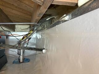 Next, our SmartSump System was implemented to efficiently collect and remove water from the crawl space, providing reliable protection against future seepage and flooding.