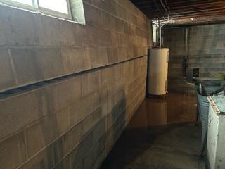 Before: Our Design Specialist, Chuck, recommended securing GeoLock Wall Anchors on the separating and bowing wall.