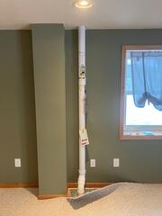 During: Our Foreman, Dakota, secured the Radon Mitigation System in the home.