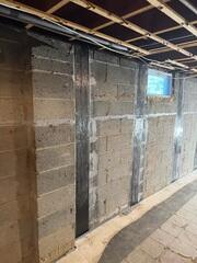 Our CarbonArmor Wall Reinforcement System was added to stabilize bowing walls, prevent further movement, and ensure the structural integrity of the basement, safeguarding the home against long-term foundation damage.