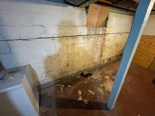 Before: A homeowner in Albert Lea, MN, noticed their basement was suffering from cracks and separation.