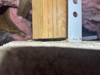 This post was not attached to the footing causing the floor upstairs to sag in this area and become bouncy.