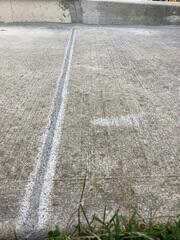 This back patio area was successfully stabilized and leveled to eliminate any uneven transitions near the door. The control joints are now fully sealed to protect against Ontario's harsh freeze-thaw cycles.