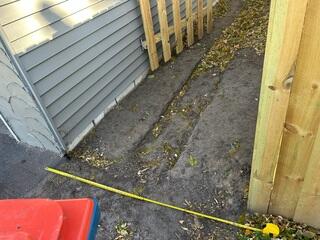 Before: Our Design Specialist, Jason, recommended installing Helical Piers along the struggling wall