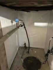 During: Our Foreman, Kevin, and his crew worked hard to complete the waterproofing transformation.