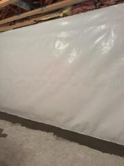 During: Our Foreman, Roel, and his crew succesfully secured all the waterproofing products in the basement.