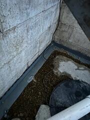 During: Our Foreman, Kevin, and his crew secured WaterGuard around the basement perimeter.