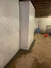 Waterguard, a interior drainage system was installed along with a triple Safe Sump pump and Clean Space vapor barrier. The basement is now protected from any more water intrusion and further damage.