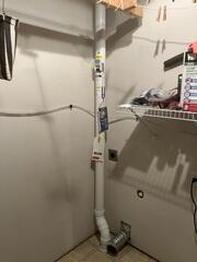 During: Our Foreman, Dakota, and his crew secured the Radon Mitigation System inside the home.