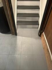 ThermalDry Basement Floor Matting was added to protect the basement floor from moisture while improving comfort underfoot.