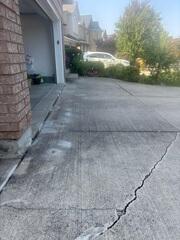 Lifting and Stabilization We injected a high-density polyurethane system to lift this slab an inch and a half, restoring a flush, level surface and eliminating the trip hazard entirely.