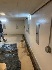 During: Our Design Specialist, Ryan, recommended waterproofing the entire basement.