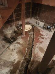 During: Our Foreman, Lane, and his crew secured the waterproofing products throughout the basement.