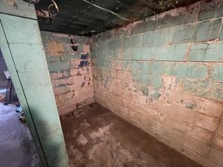 Before: Our Design Specialist, Ryan, recommended securing GeoLocks along the struggling foundation walls.