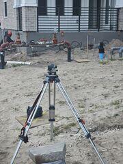 Monitoring structural lift with survey instruments.