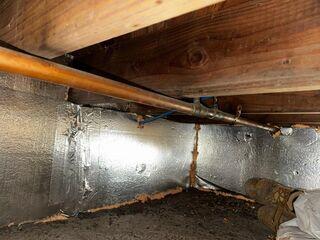 We installed SilverGlo Insulation Panels to combat water seepage by creating a moisture-resistant thermal barrier along the crawl space walls.