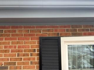 This picture, taken before we started the work, shows a crack sprawling from the top left corner of the window.