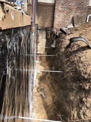 During: Juan, our Foreman, and his crew successfully secured the GeoLock Wall Anchors along the foundation.