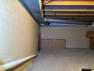 Before: Daniel, one of our Design Specialists, recommended installing a perimeter drain system.