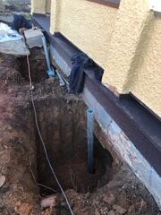 Place Push pier system in the ground.