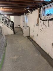 Our SaniDry Dehumidifier was also added to control excess moisture in the air and improve overall basement air quality.