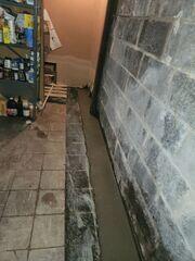WaterGuard was installed to capture groundwater at the foundation's perimeter before it could reach the basement floor.