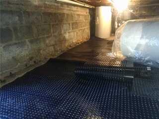 Drainage Matting was installed on the floors to eliminate standing water.