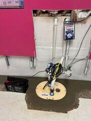 The sump pump is now in place to safely collect and discharge groundwater away from the building.