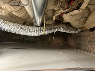 During: Our crew successfully installed the products in the crawl space.