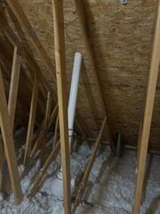 During: Our Radon Sales + Service Technician, Jackson, secured the radon fan in the attic above the garage.