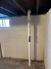 During: Our Radon Sales + Service Technician, Jackson, installed the Radon Mitigation System in the home.