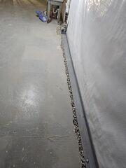 WaterGuard is an interior drainage system designed to capture water at the wall and floor joint before it reaches the basement. It discreetly directs water to the sump system, keeping floors dry even during heavy rain.