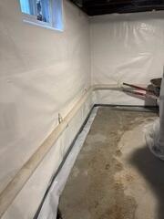WaterGuard is an interior drainage system that captures water at the wall-floor joint and directs it to the sump pump. Installed out of sight, it keeps the basement dry without disrupting the finished look.