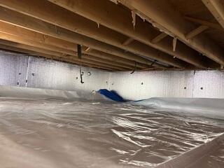 SilverGlo was installed on the walls to insulate the space.