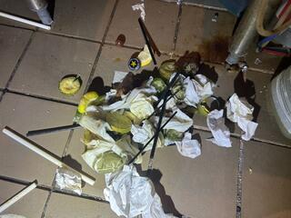 There were just piles of old food and garbage throughout the kitchen.