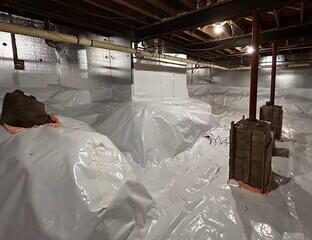 The crawl space is now properly encapsulated with our CleanSpace vapor barrier.