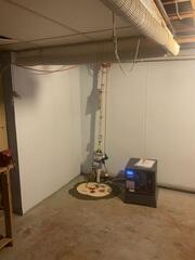 To address lingering moisture and high humidity levels, our SaniDry Sedona Dehumidifier was added to create a healthier basement environment.