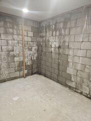Before: Our Design Specialist, Daniel, recommended installing several waterproofing products throughout the basement.