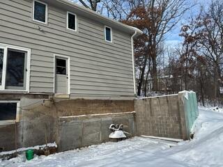 Our Design Specialist, Ryan, recommended stabilizing the struggling foundation walls with GeoLocks and Helical Piers.
