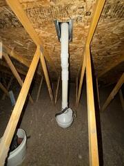 During: Our Foreman, Dakota, and his crew secured the Radon Mitigation in the attic above the garage